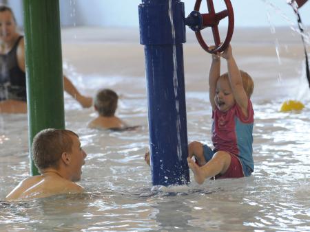 Kids playing in the splash Pool at the Smithfield Aquatic Center.