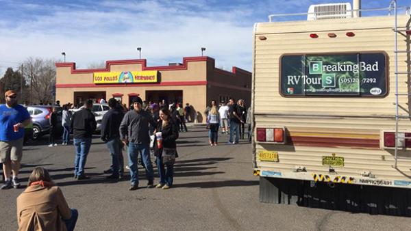 A group of people outside the RV for the Breaking Bad RV Tours