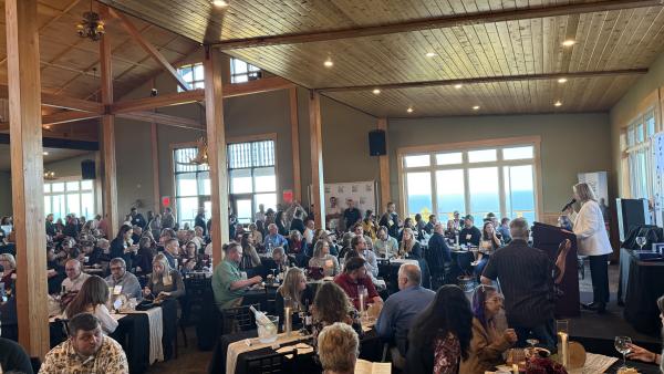 Shot of the crowd at the 2026 Fall Gala at the Summit Chalet at Lutsen Mountains