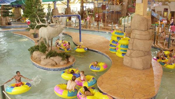 Children riding tubes in the lazy river at Tundra Lodge Resort and Waterpark