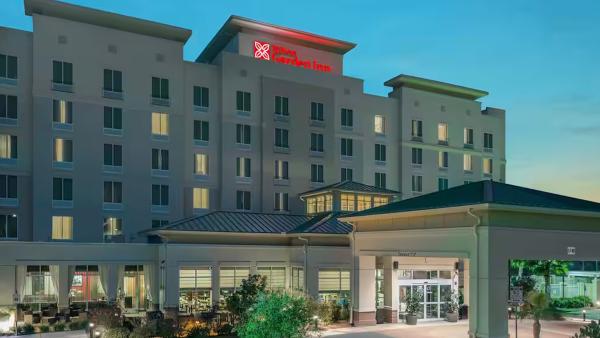 Hotel building facing parking lot