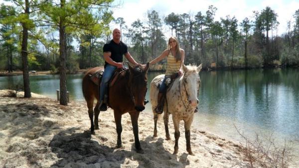 Couple Trail Riding at Splendor Farms