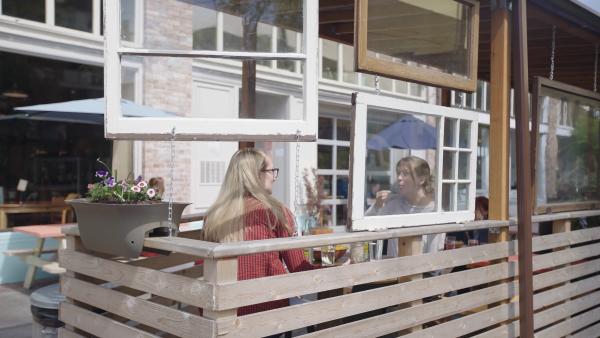 Patrons dining outside on the Little Conejo Patio