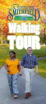 The brochure of the Smithfield Walking Tour features a a couple strolling along a pavement path.