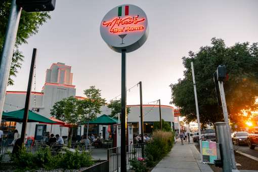 The neon sign of M'Tucci's Bar Roma