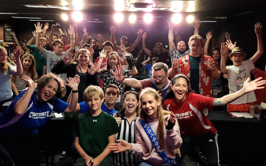 Birthday celebrants take the stage and get sung to