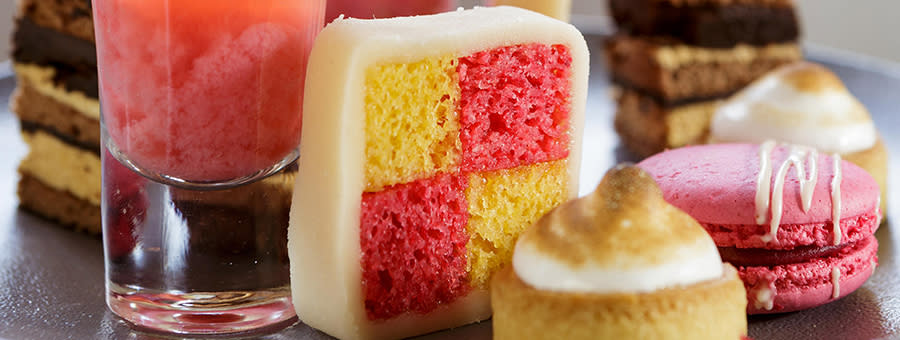 Close up of cakes and fancies for afternoon tea at the Slaughters Manor House