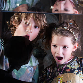 Kids excited by mirror activity at Ripley's Believe it or Not!