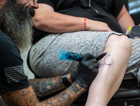 Tattoo being placed