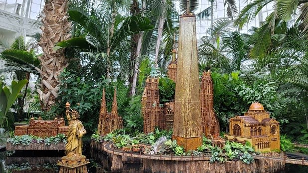 The Statue of Liberty and other landmarks made of plant material at the New York Botanical Garden Holiday Train Show