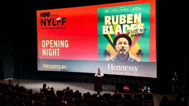 Red screen in a theater showing the opening night screening at the Latino Film Festival