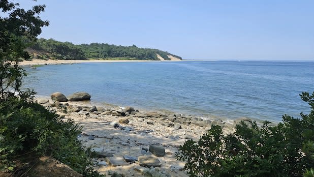 View from the shore looking out at the blue water at Caumsett State Park