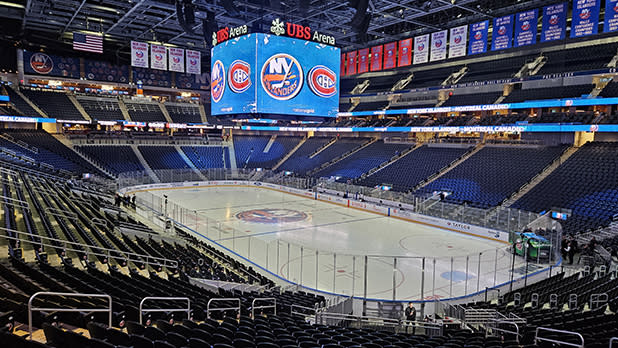 Ice rink at UBS Arena with the jumobotron displaying the Islanders and Canadiens logo ahead of an NHL game.