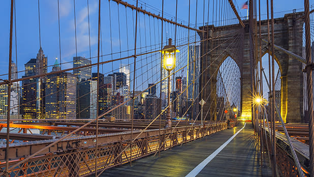 A view of Brooklyn Bridge from the bridge with the Manhattan skyline in the background