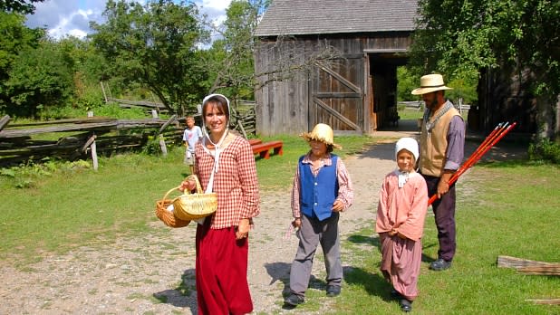 Family Dressed in Old Timely Clothes at Genesee Country Village & Museum in NY