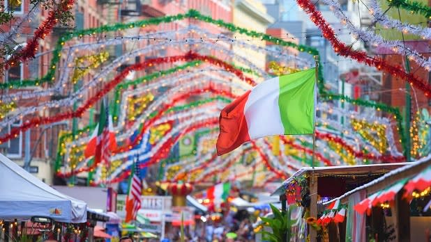 An Italian flag flies at the Feast of San Gennaro on Mulberry Street in Little Italy