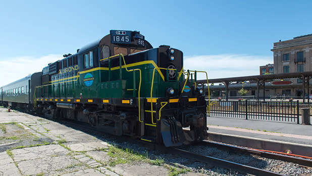 Adirondack Railroad train pulling into the station.