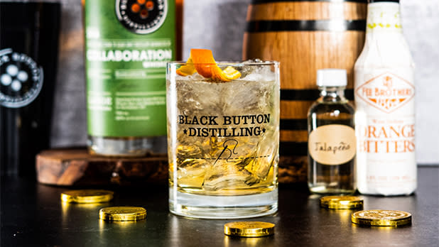 Cocktail and bottles from Black Button Distilling