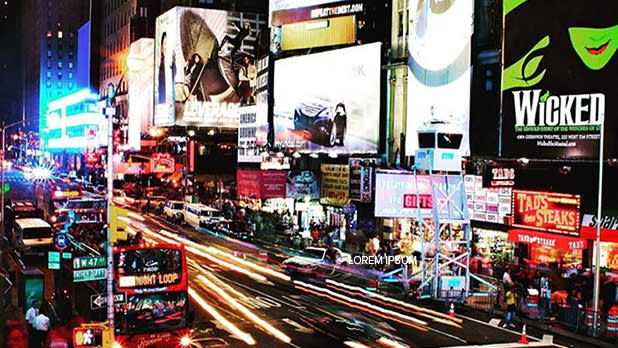 Broadway and 47th Street illuminated by billboards at night