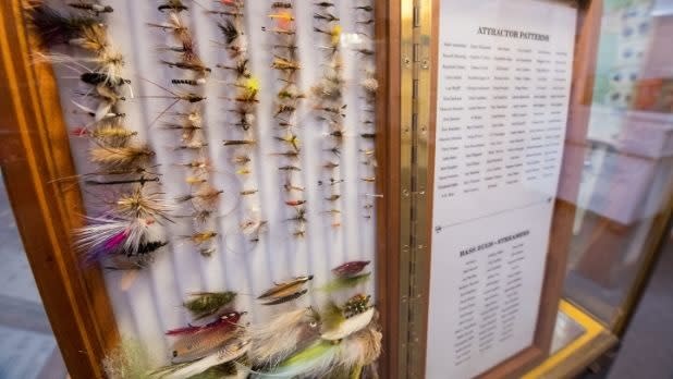 Glass case with fishing flies at Catskill Fly Fishing Center & Museum