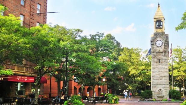 People Strolling around Market Street in front of the clock tower