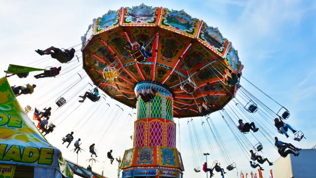 Carousel moving with children on it at the Empire State Fair on Long Island