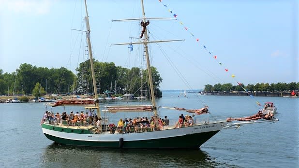 Spirit of Buffalo, 73-foot Top Sail Schooner cruising out into Lake Erie from Canalside in Buffalo