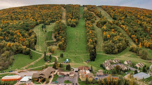 Hills covered in fall colors in Bristol Mountain