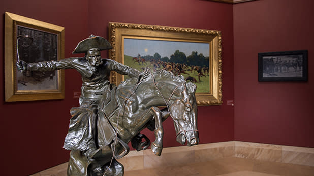 A cowboy sculpture at the Frederic Remington Museum