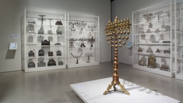 A menorah and other lamps in a gallery at the Jewish Museum