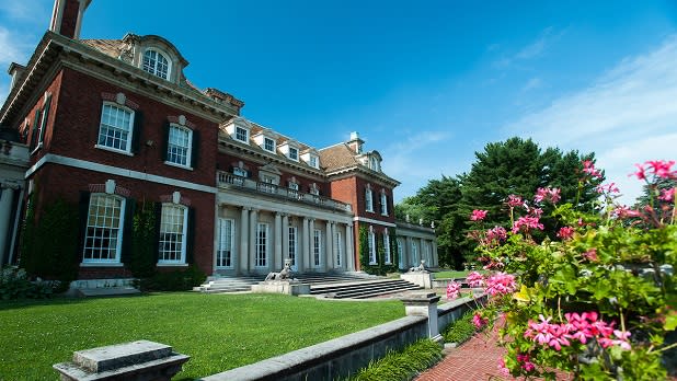 Exterior shot of the 44-room English manor house at Old Westbury Gardens