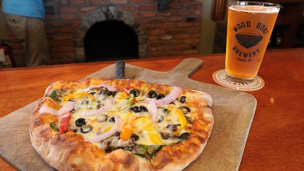 A pizza and pint of beer at Wood Boat Brewery