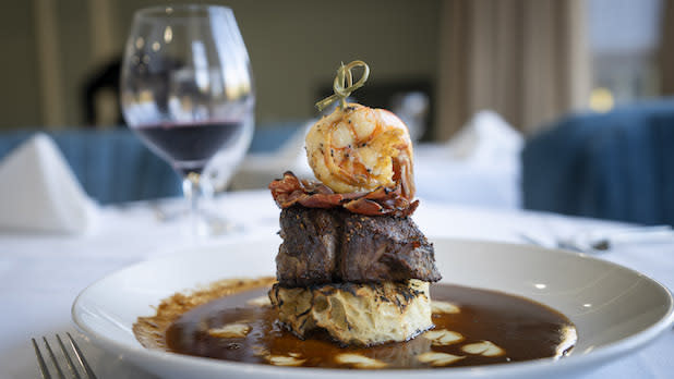 A surf and turf dish and a glass of red wine from Limoncello at the Orange Inn in the Hudson Valley
