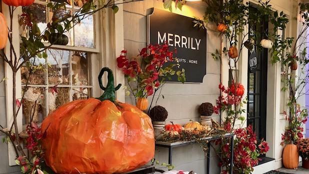 Storefront for local shop Merrily in Sugar Loaf, NY decked out in fall decor