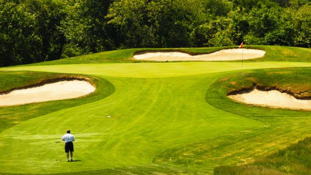 Man golfing At Montauk State Park