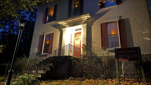 Night sets on the exterior of the Museum of Wayne County