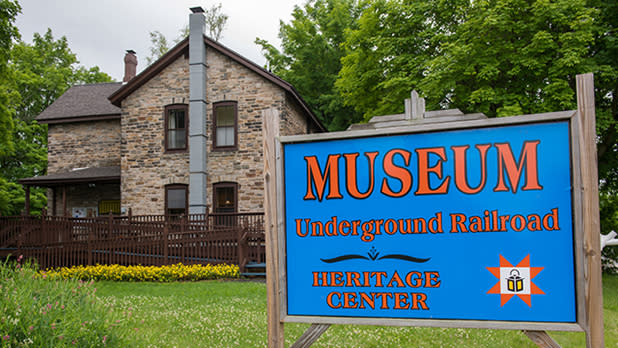Building exterior and sign for North Star Underground Railroad Museum in Ausable Chasm, NY.