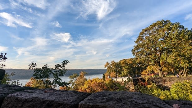 The Hudson River and Palisades seen from Fort Tryon Park as trees change to fall colors