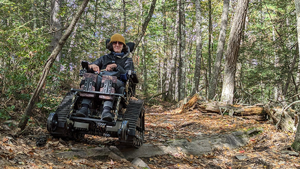 A person uses an Action Trackchair to go hiking in the Catskills with Northeast Off-Road Adventures