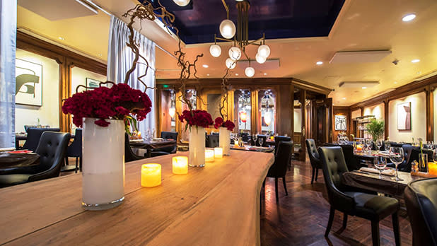 Interior view of the dining room at the Red Salt Room at the Garden City Hotel