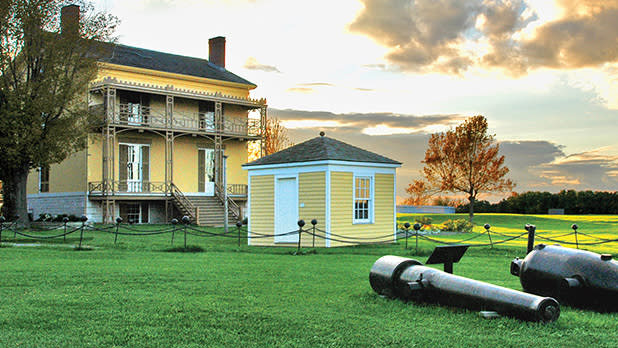 Yellow and white house at Sackets Harbor Historic Site