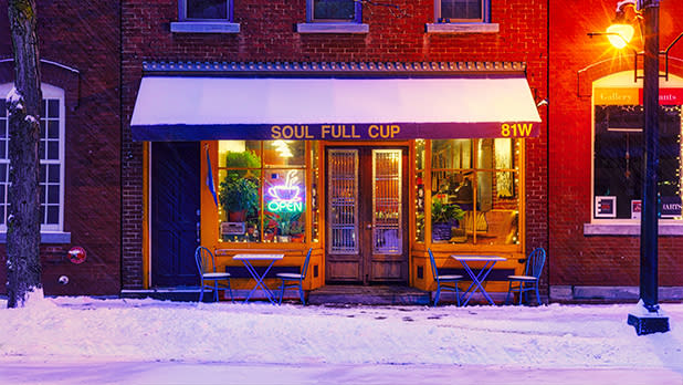 Snow blankets the sidewalk outside the Soul Full Cup in Corning