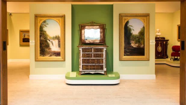 Room with paintings inside of an art museum