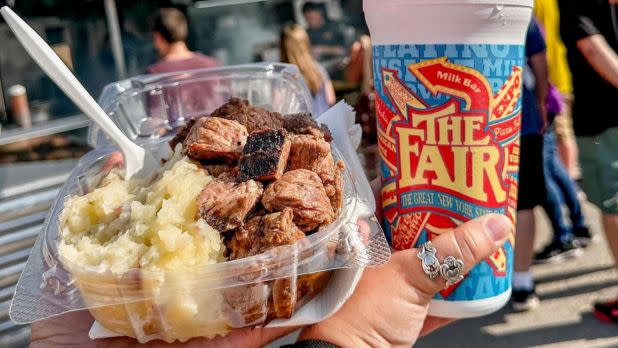 container of mashed potatoes and meat