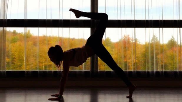 A photo of a girl doing a yoga pose at Yo1 Wellness Resort and Spa