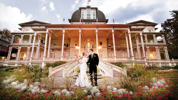 Bride and groom in front of Athenaeum Hotel of Chautauqua Institution in Chautauqua, New York