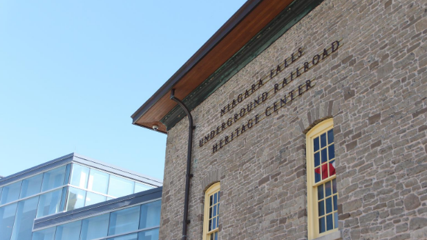 The exterior of the Niagara Falls Underground Railroad Heritage Center building and sign