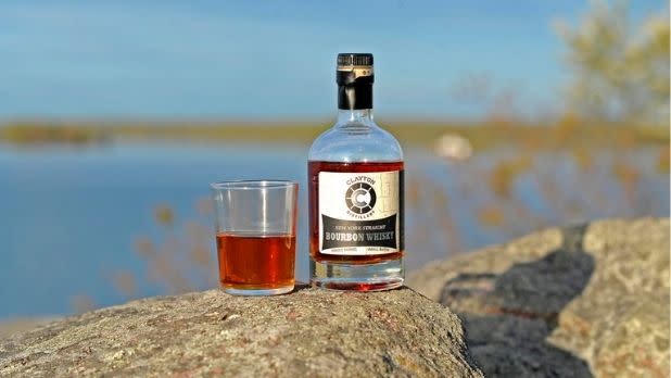 Clayton Distillery, bourbon with a scenic lake background