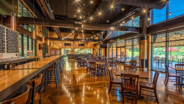 Inside of a rustic bar. Shimmering lights.