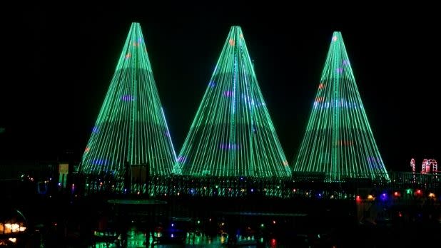 Three Christmas trees made of green lights at Jones Beach